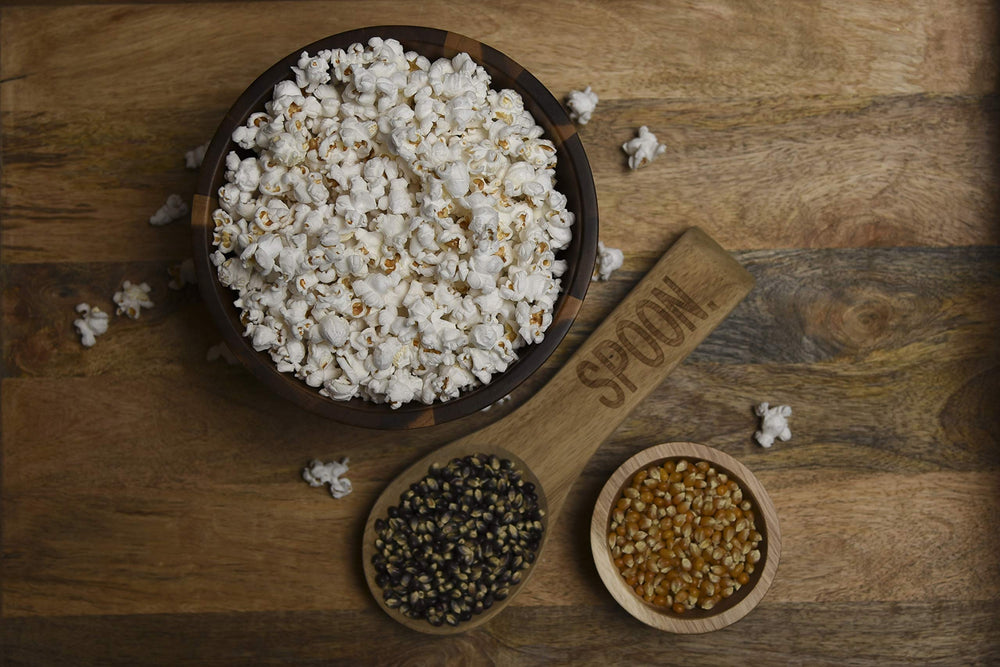Amish Country Popcorn two bags next to a ruler illustrating true 2 lb size for pantry stocking