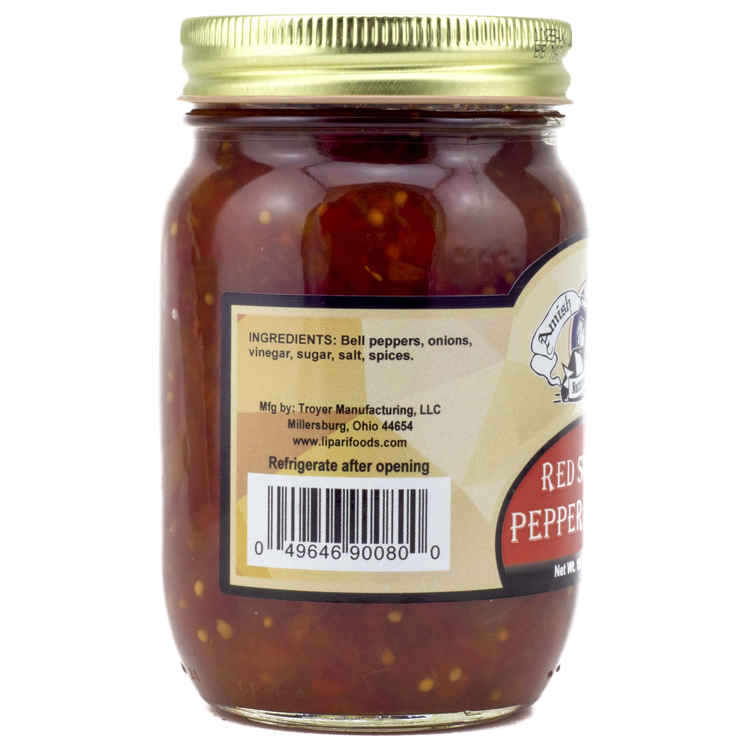 Amish Wedding jar next to a measuring cup showing scale and portion planning benefit