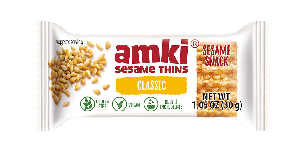 Amki sesame thins 24-pack stacked showing bulk value and storage