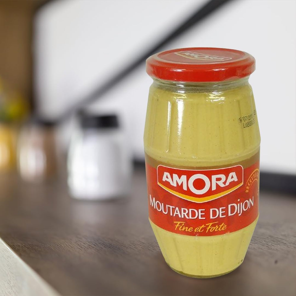Hand holding Amora Dijon jar for scale, 440g size practical for households