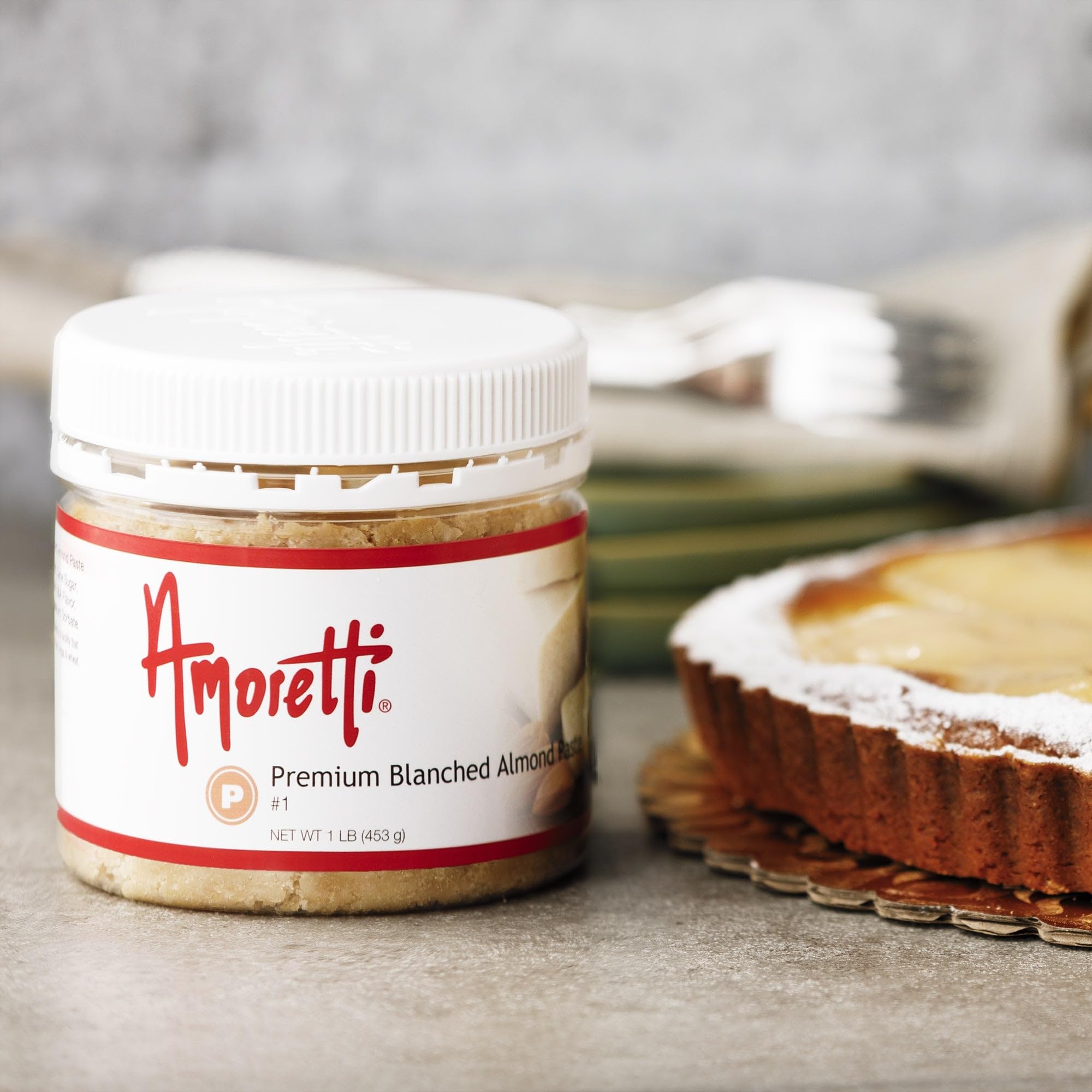Kitchen scale reading one pound with Amoretti package indicating convenient size