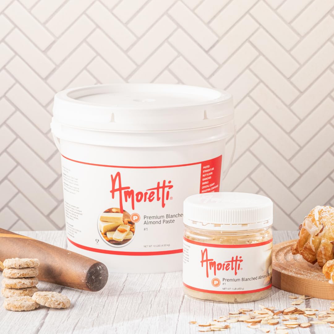 Wooden spoon lifting Amoretti paste demonstrating easy scoopability and blendability