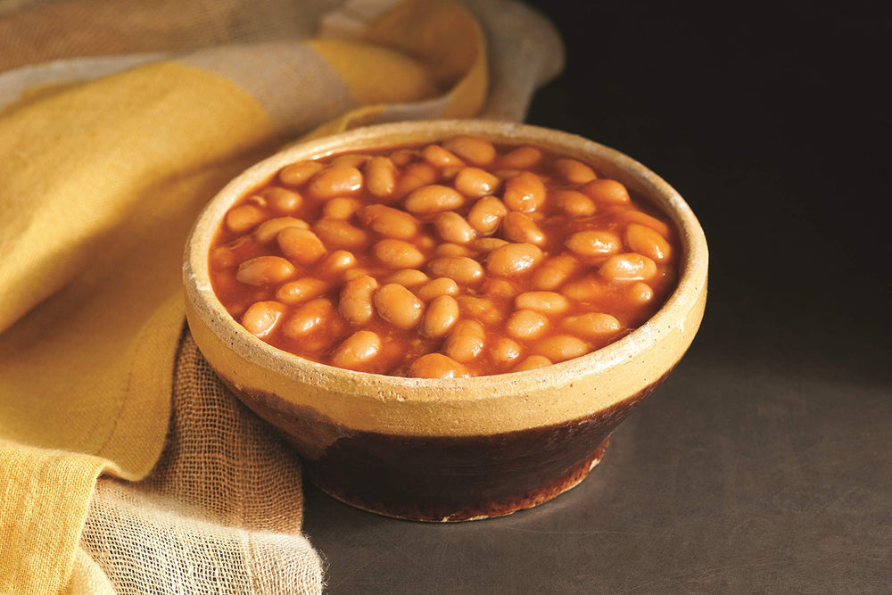 Amy's spoon scooping beans into bowl demonstrating easy serving idea