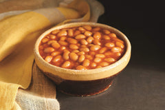 Amy's spoon scooping beans into bowl demonstrating easy serving idea