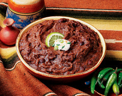 Amy's spoonful close-up of refried black beans showing creamy texture and appetite appeal