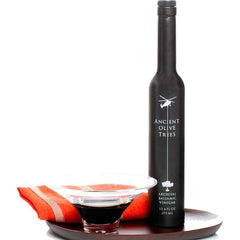 ANCIENT OLIVE TREES viscous balsamic drizzling over salad for flavor boost