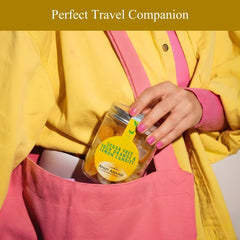 ANDY ANAND bag next to a hand for scale, demonstrates 7-ounce size and travel-friendly portioning