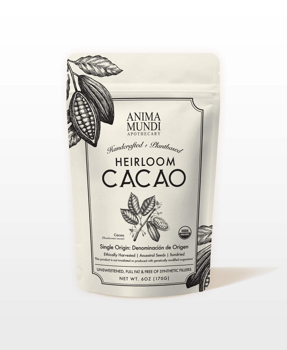 Anima Mundi cacao powder beside whole cacao beans demonstrating single-origin authenticity