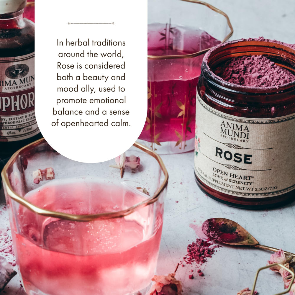 Anima Mundi pouring rose powder into latte, adds floral aroma and soft pink color