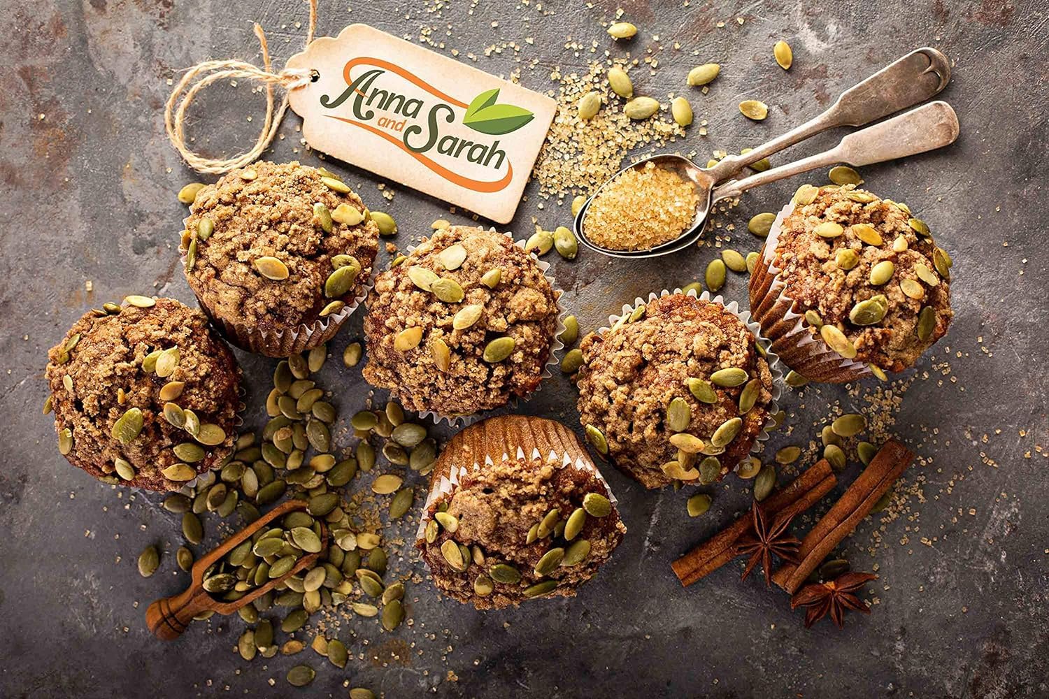 Anna and Sarah pumpkin seeds in a wooden scoop demonstrating easy portioning for snacks or recipes
