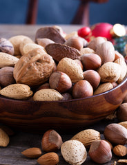 Anna and Sarah cracked walnut exposing kernel for easy snacking benefit