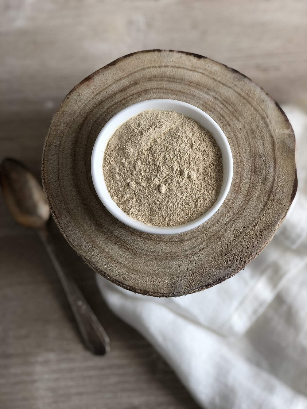 Anthony's scoop of black maca beside teaspoon showing serving size guidance