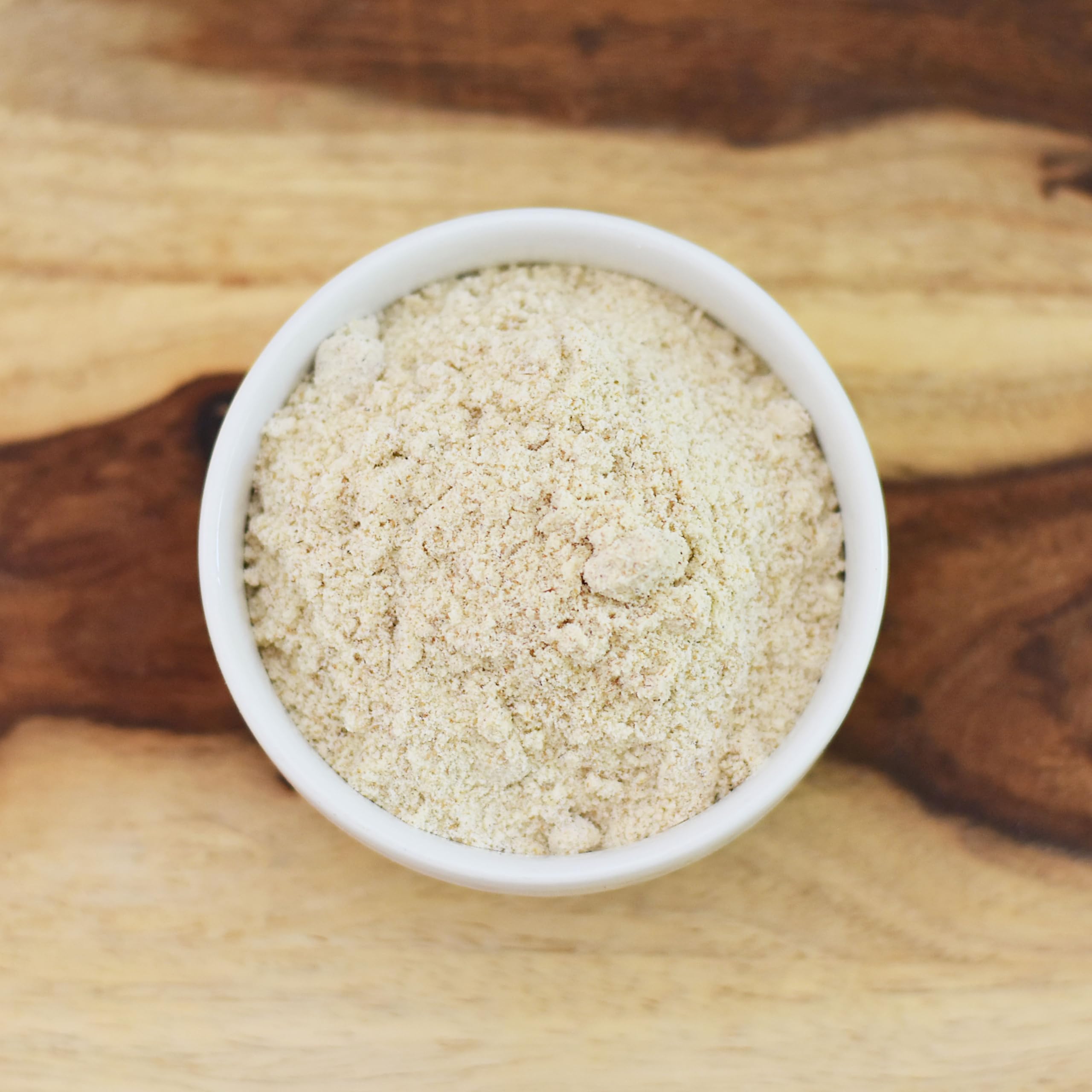 Anthony's measuring scoop and spoons with flour showing accurate portioning benefit