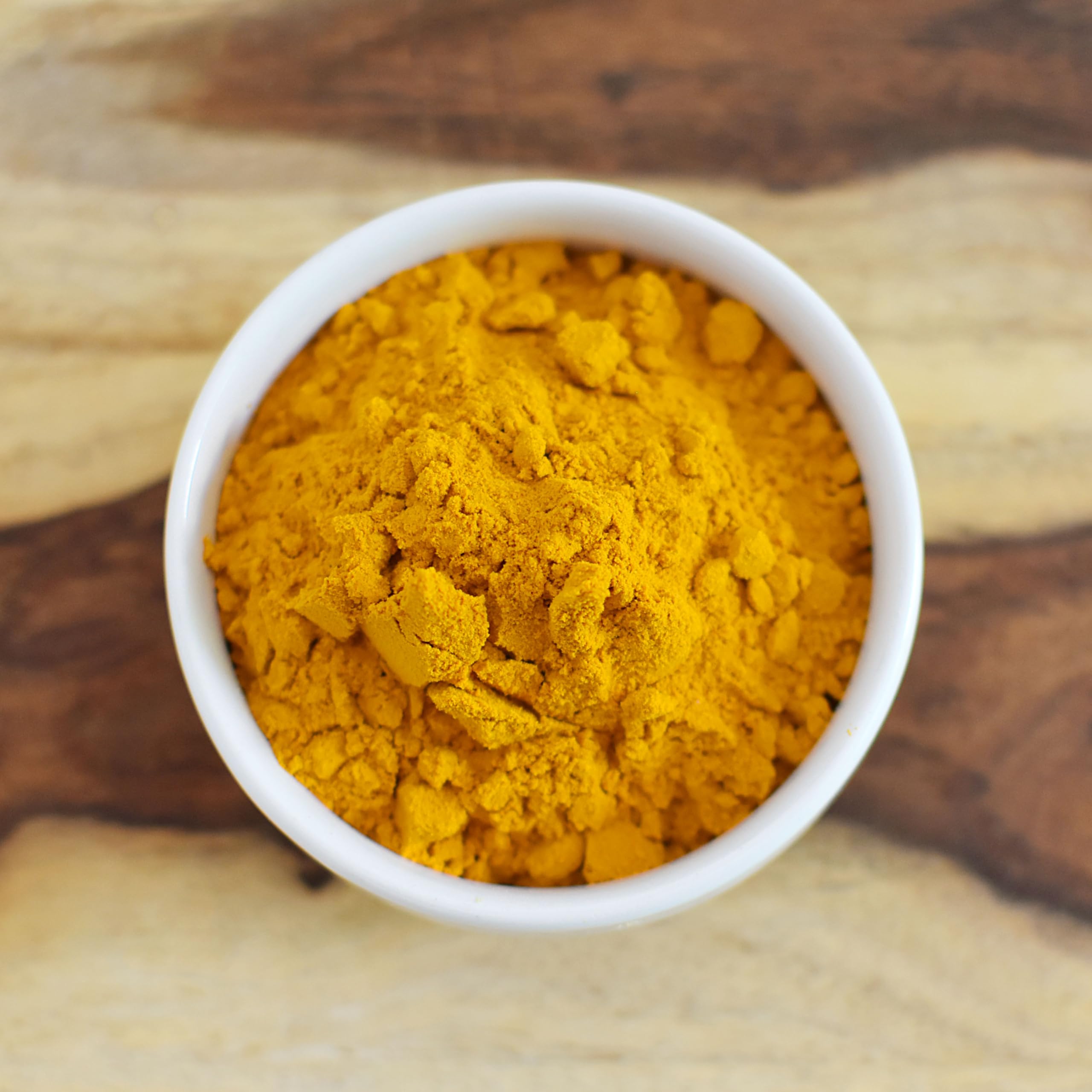 Anthony's turmeric blended in a smoothie glass benefit: natural color and flavor boost