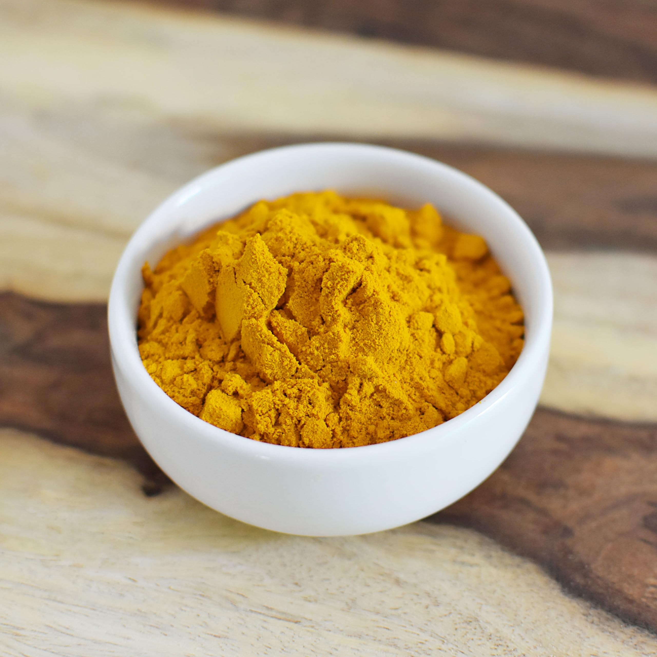 Anthony's measuring spoon with turmeric on scale benefit: accurate portioning for recipes
