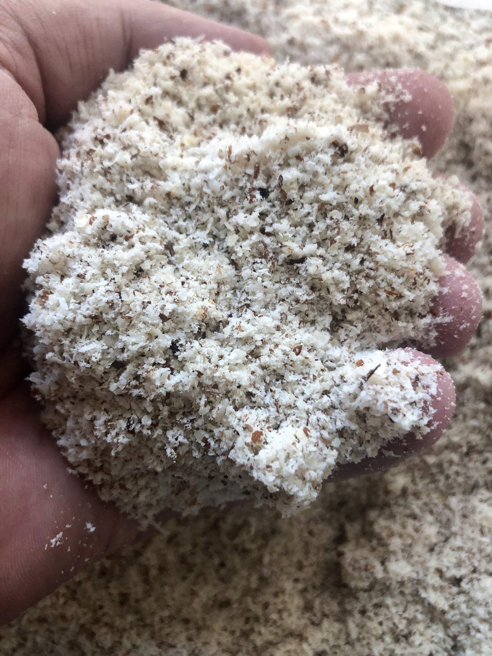 Apricot Bitter Kernel Meal staged in bathroom lifestyle setting for natural skincare routine