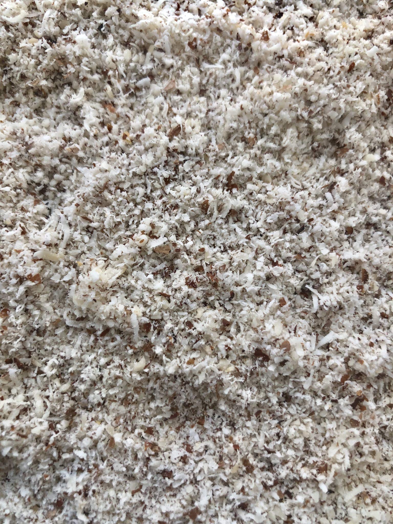 Apricot Bitter Kernel Meal close-up texture revealing fine grains and exfoliating benefit