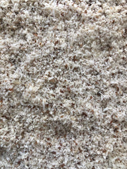 Apricot Bitter Kernel Meal close-up texture revealing fine grains and exfoliating benefit