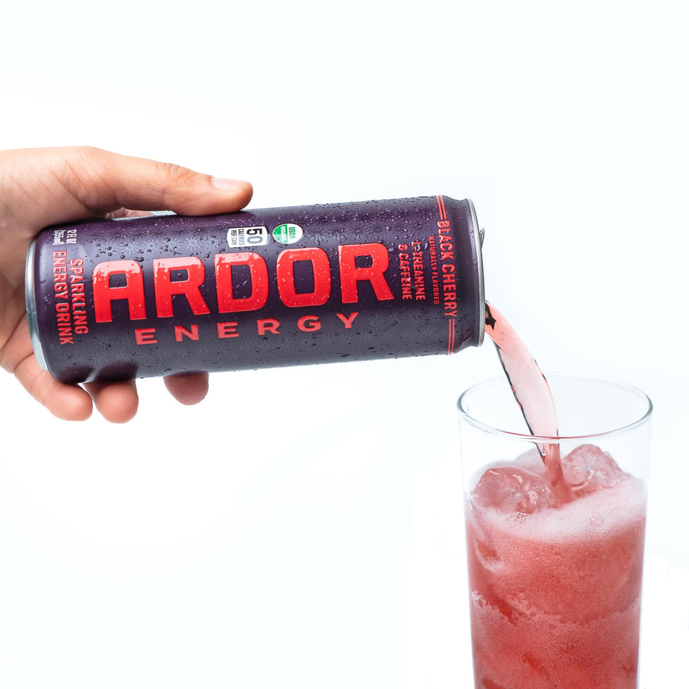 ARDOR Black Cherry on a work desk beside laptop for sustained focus and midday boost
