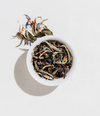 Art of Tea sachet steeping in cup to show brewing clarity and aroma