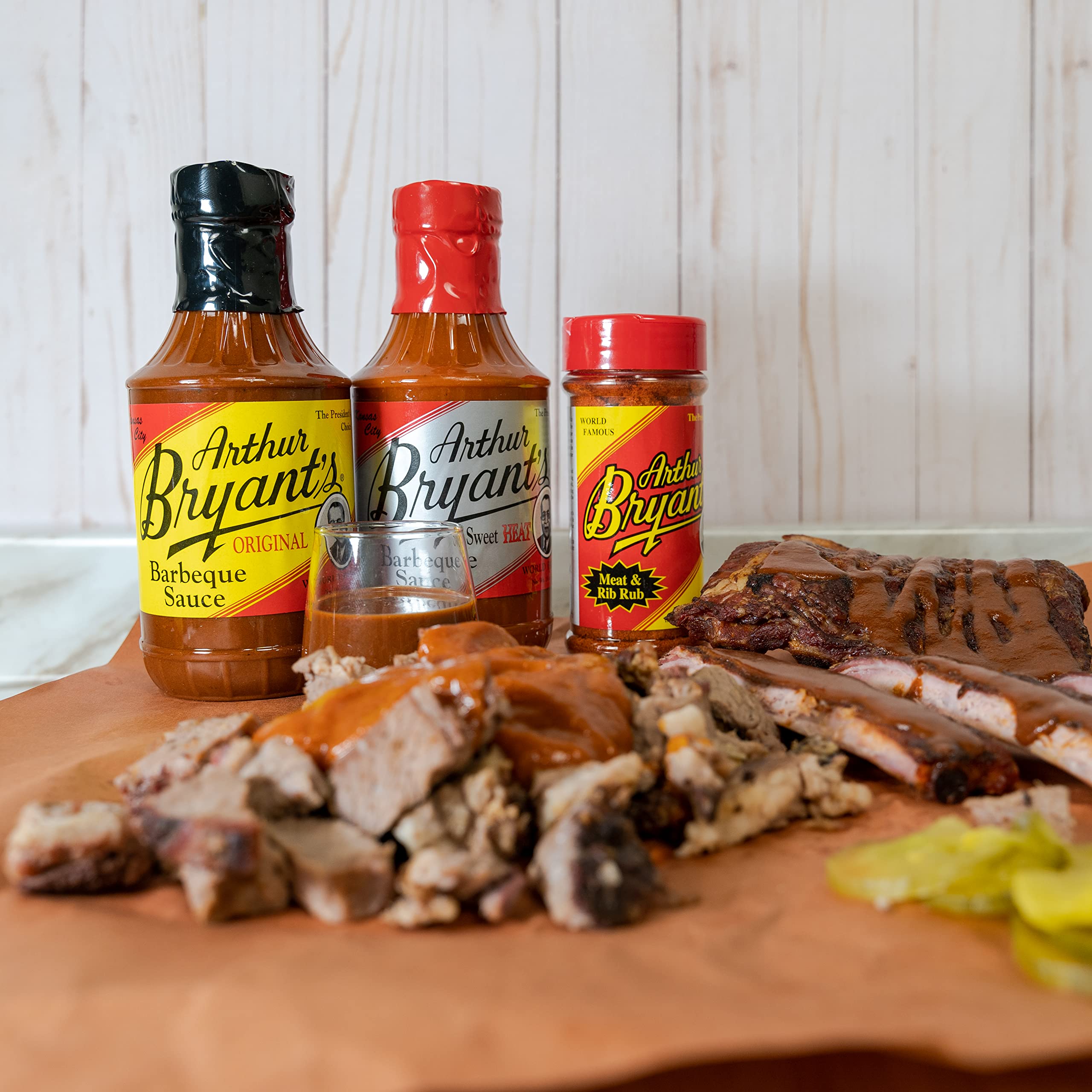 Arthur Bryant's Rich & Spicy sauce texture drizzling to show bold seasoning and grilling appeal