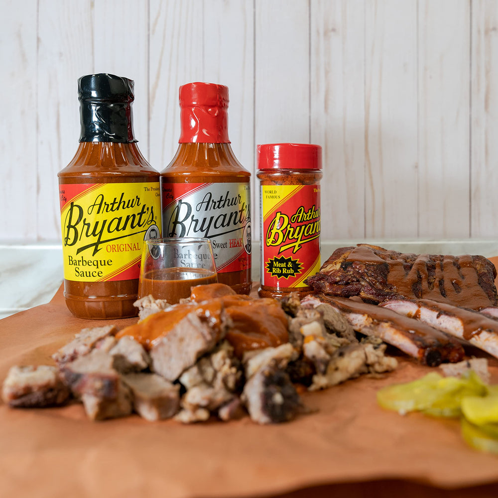 Arthur Bryant's Rich & Spicy sauce texture drizzling to show bold seasoning and grilling appeal