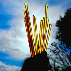 Arvoli honey straw drizzling over toast for a fragrant sweet finish benefit
