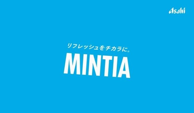 Asano Mintia pack next to coin showing compact size for travel