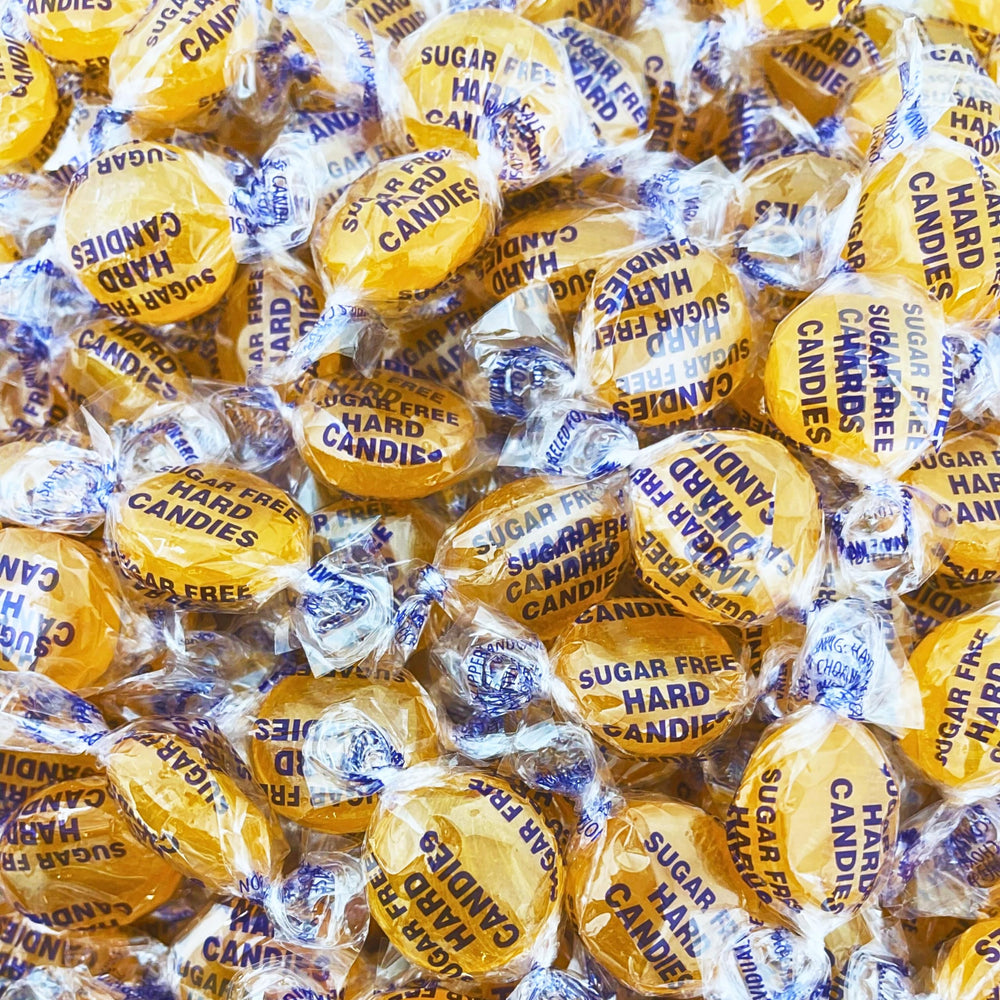 Assortit candy in hand to show size and portion control for dieting