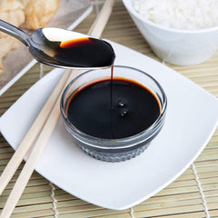 assortit kikkoman kitchen lifestyle with jug near stove for efficient cooking
