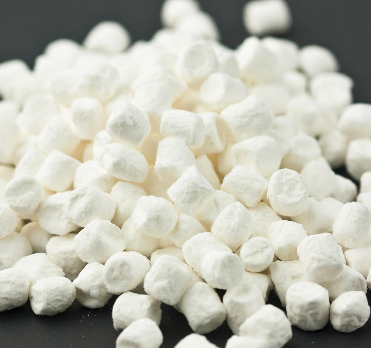 Assortit marshmallows melting in hot cocoa adding creamy sweetness