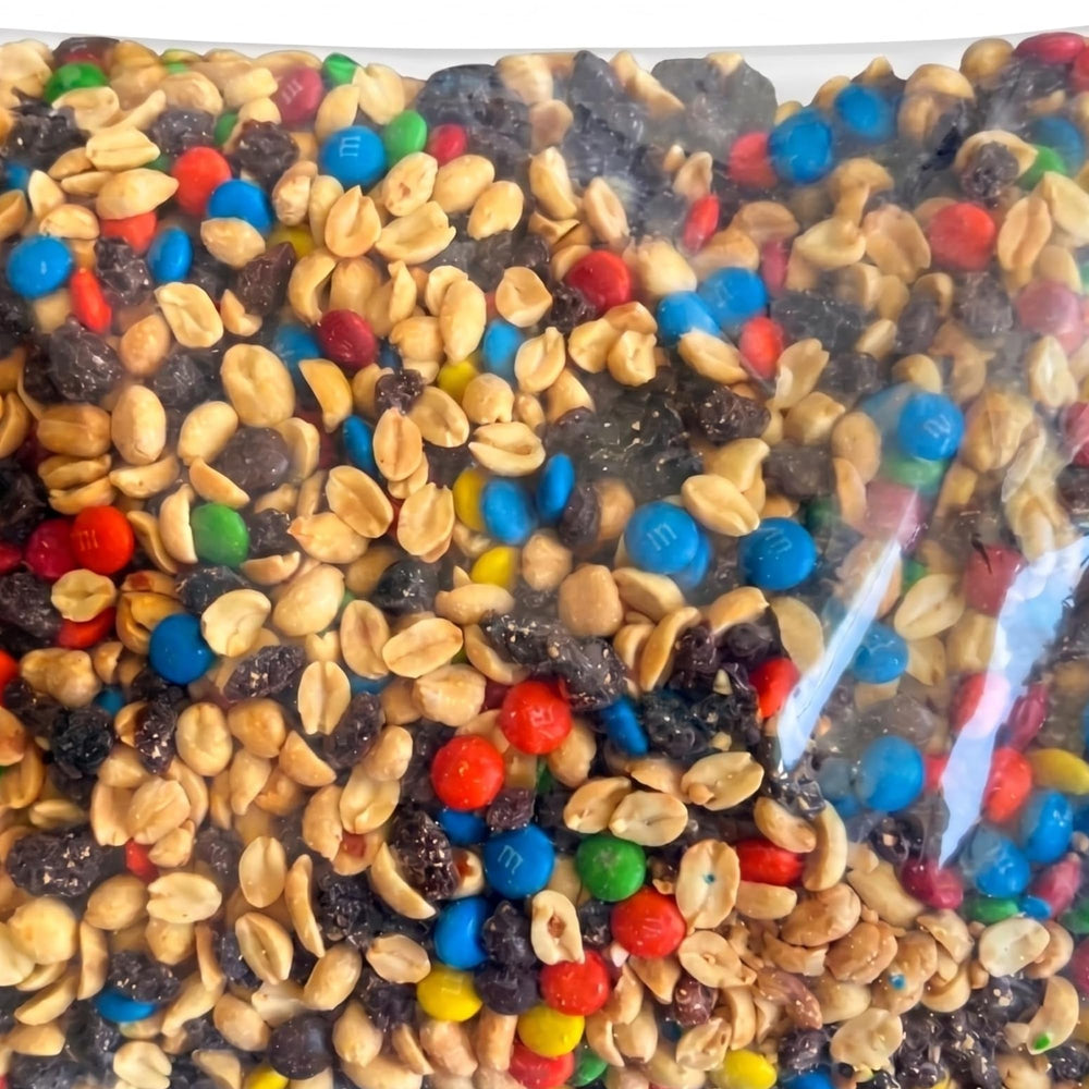 Close-up of Assortit mix texture highlighting peanuts raisins and M&M'S for visible variety