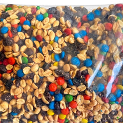 Close-up of Assortit mix texture highlighting peanuts raisins and M&M'S for visible variety
