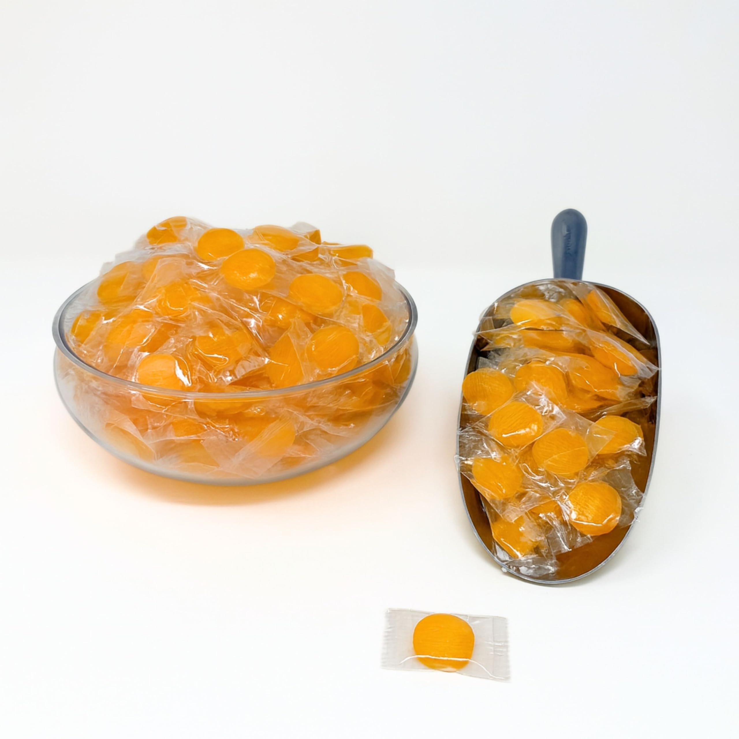 Assortit close-up of candy surface highlighting peach color and crunchy texture