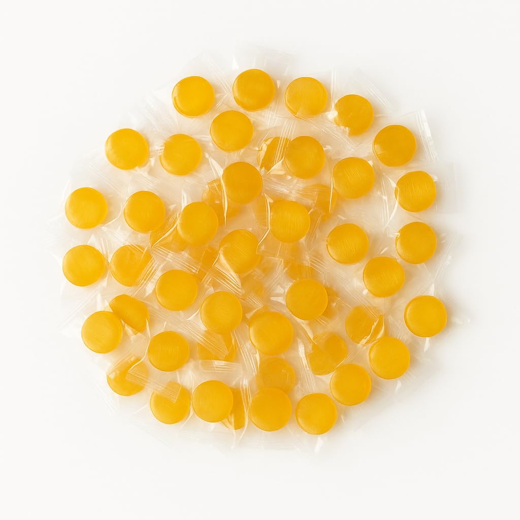Assortit peach buttons beside a ruler showing piece size for portion planning