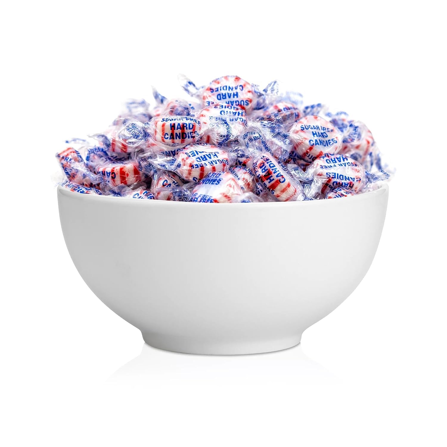 Assortit individually wrapped peppermint mints close-up for hygienic sharing