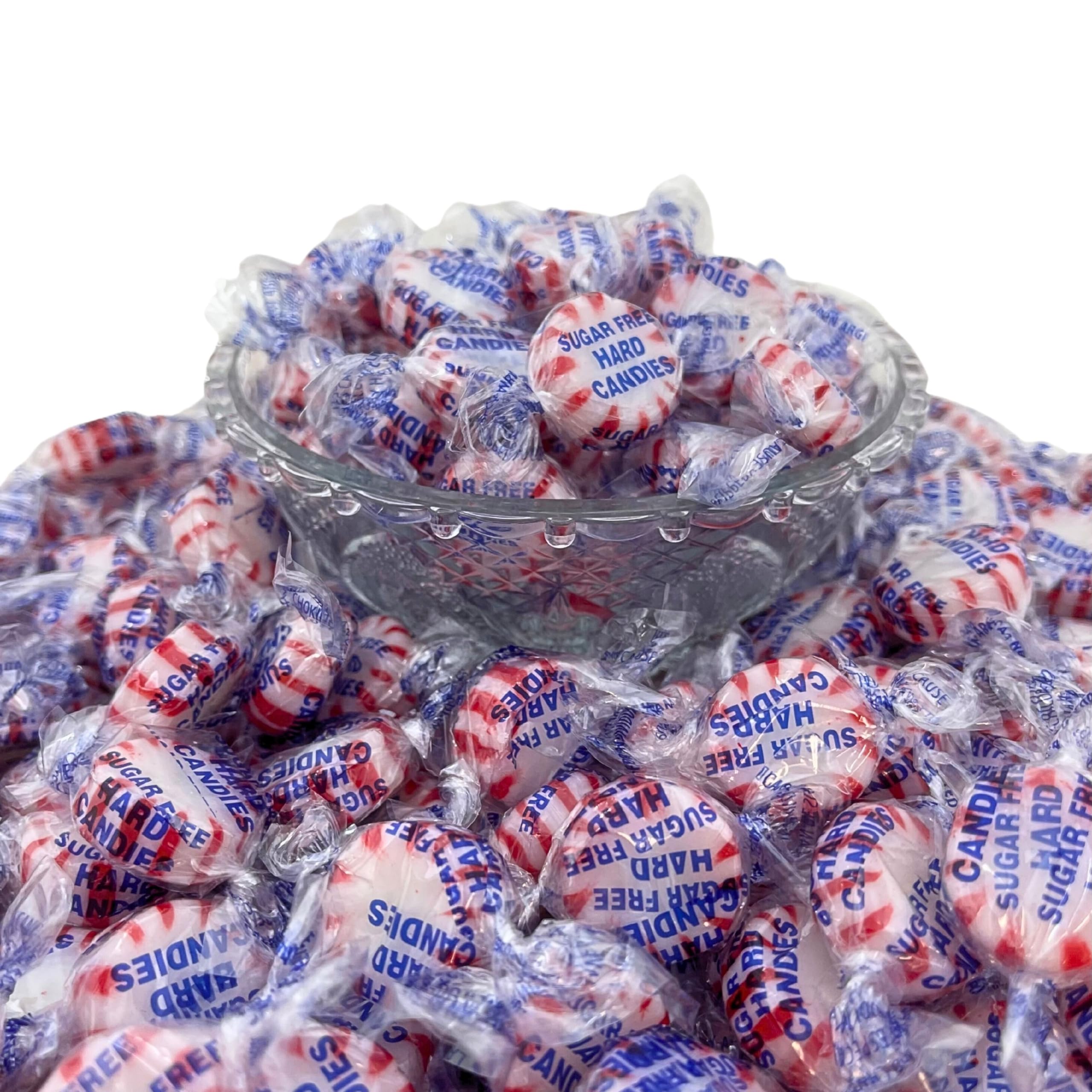 Assortit mints beside a laptop on a desk for quick breath freshening