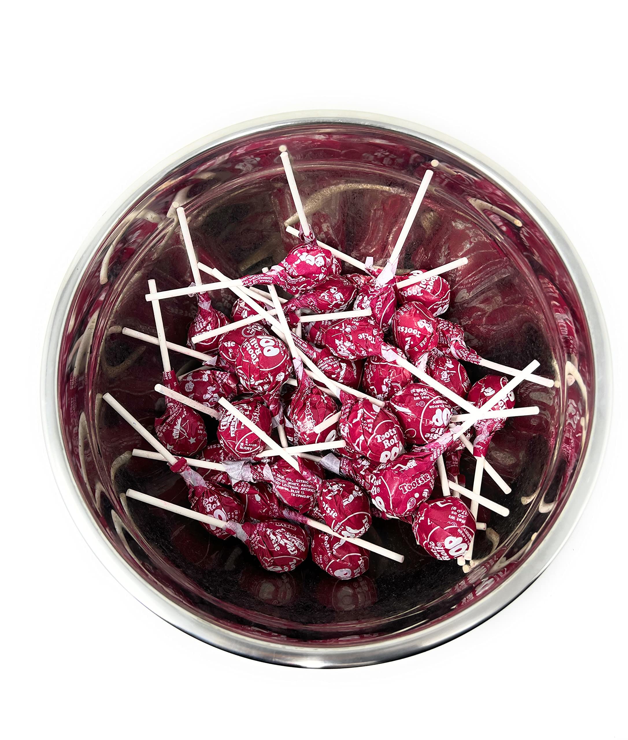 Assortit close-up of red raspberry Tootsie Pop texture highlighting candy shell