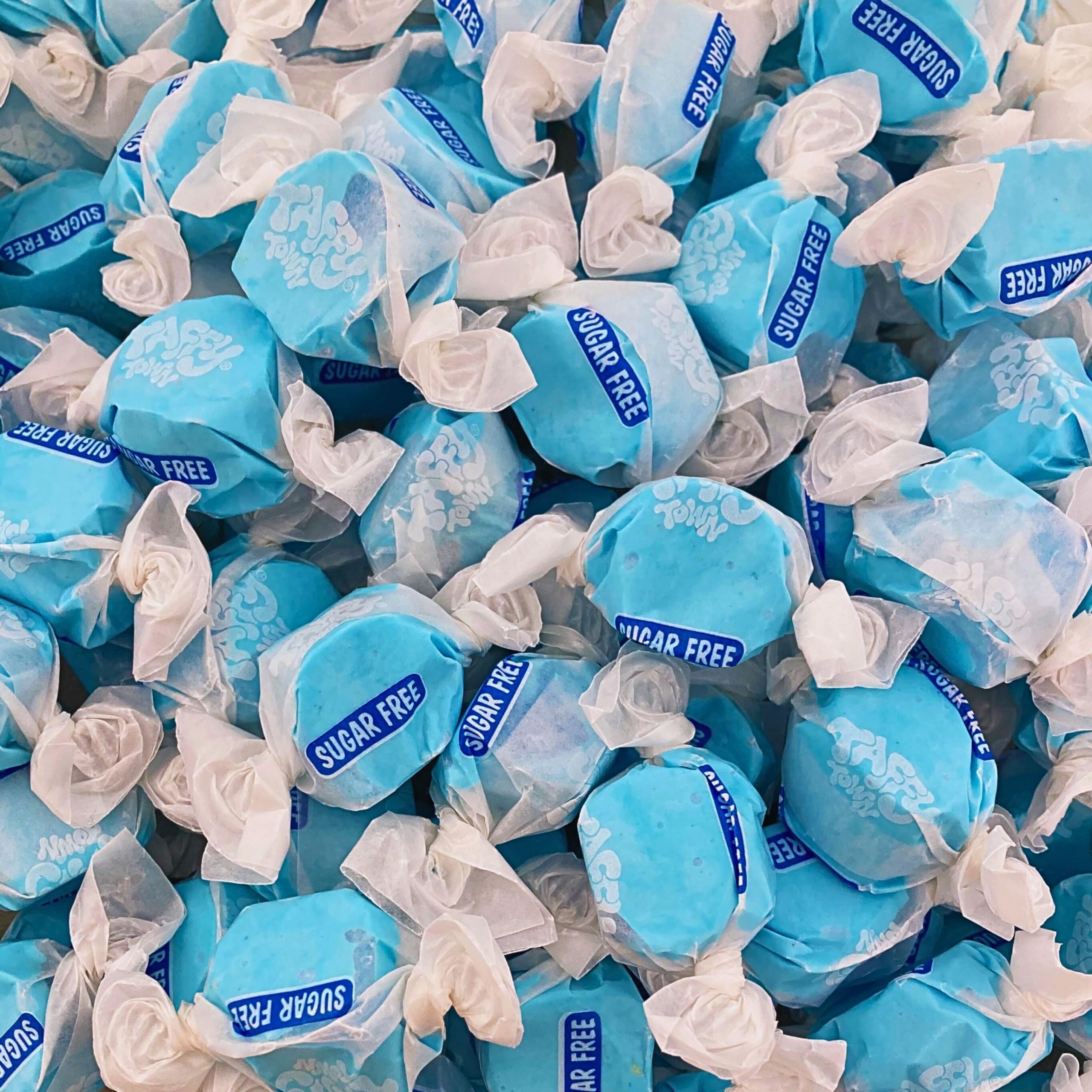 Assortit taffy in hand for size and portion comparison convenience