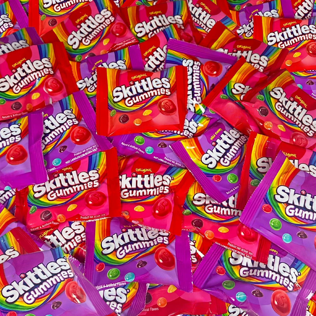 Assortit Skittles gummies front packaging showing resealable bag and weight