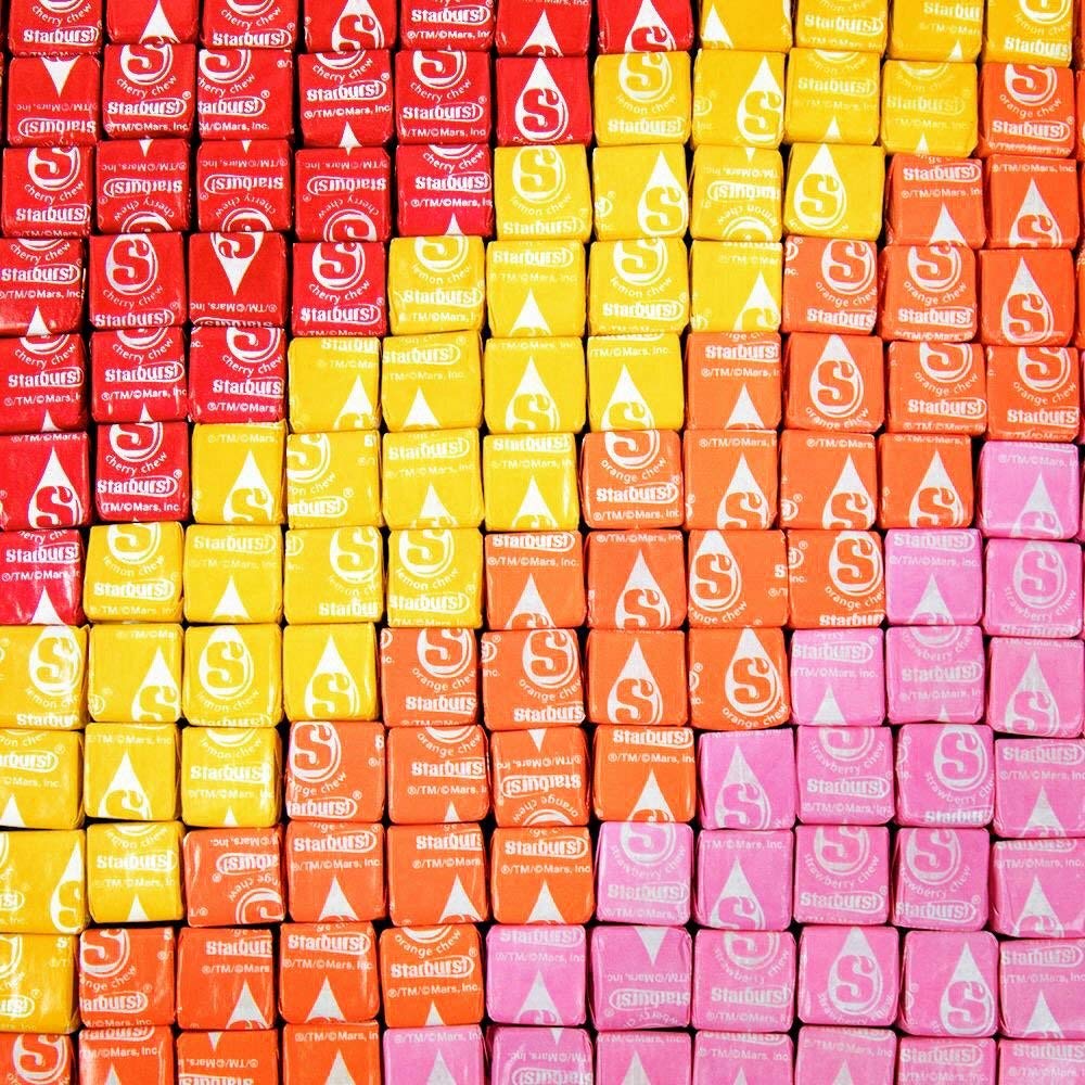 Assortit close-up of a Starburst chew showing soft texture and juicy fruit appeal