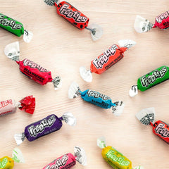 Assortit Tootsie Frooties close-up of chewy texture highlighting fruity colors and enticing chewiness