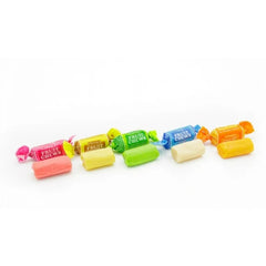 Assortit Tootsie Roll individually wrapped chews spread out for easy portioning