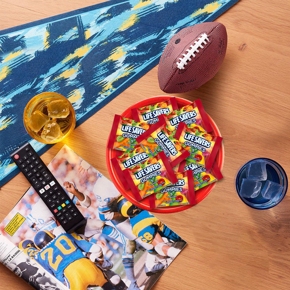 Assortit travel snack pouch with a few wrapped packs ready for on-the-go convenience