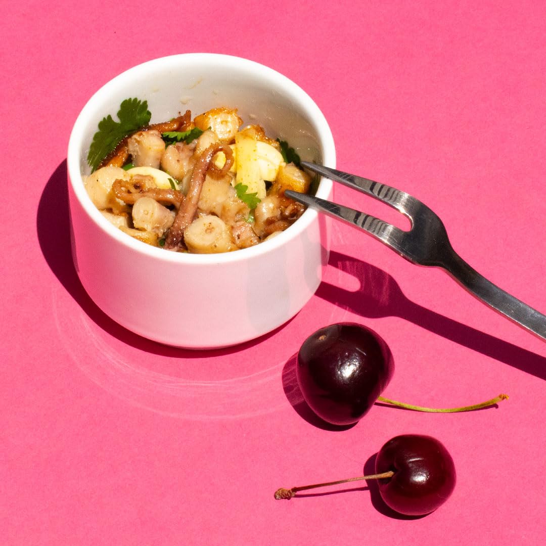 Ati Manel octopus plated as tapas with bread, highlighting convenience and flavor