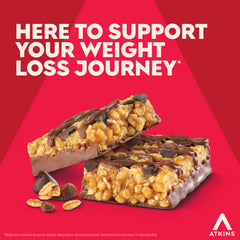 Atkins bar in hand to show real size and easy portability for on-the-go energy