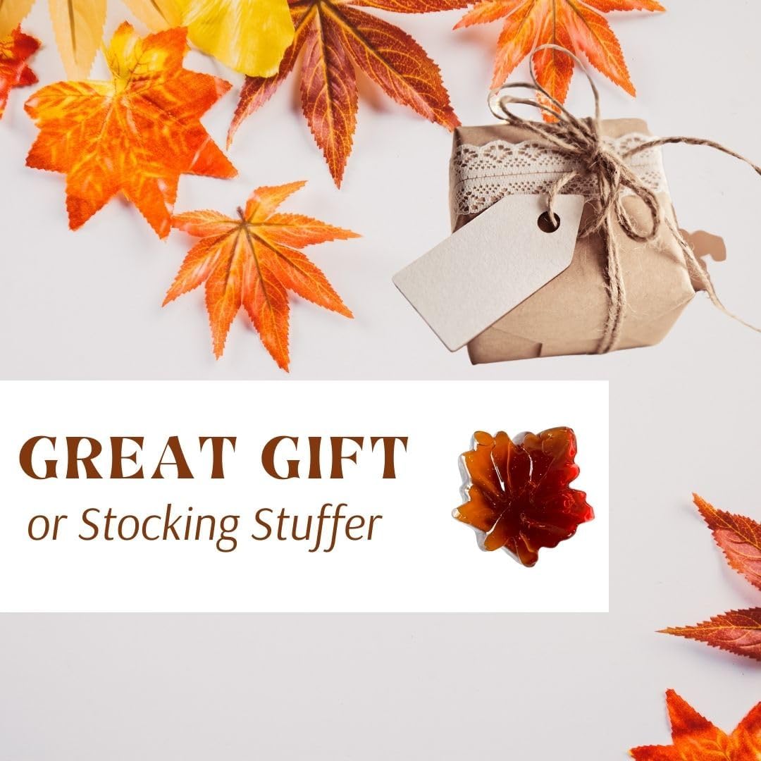 Atlantic Rush maple leaf candy on wooden surface conveying rustic Vermont origin