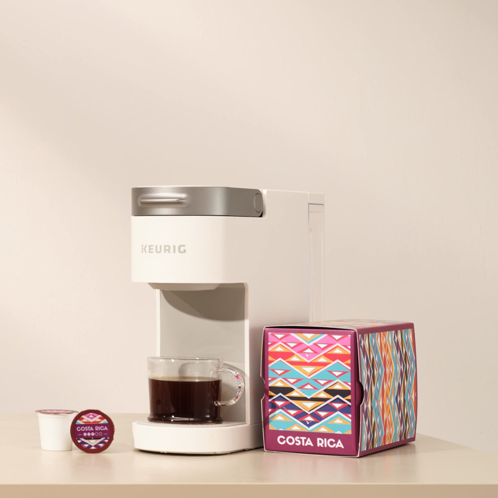 Atlas Coffee Club pack beside common objects showing 24-count size benefit