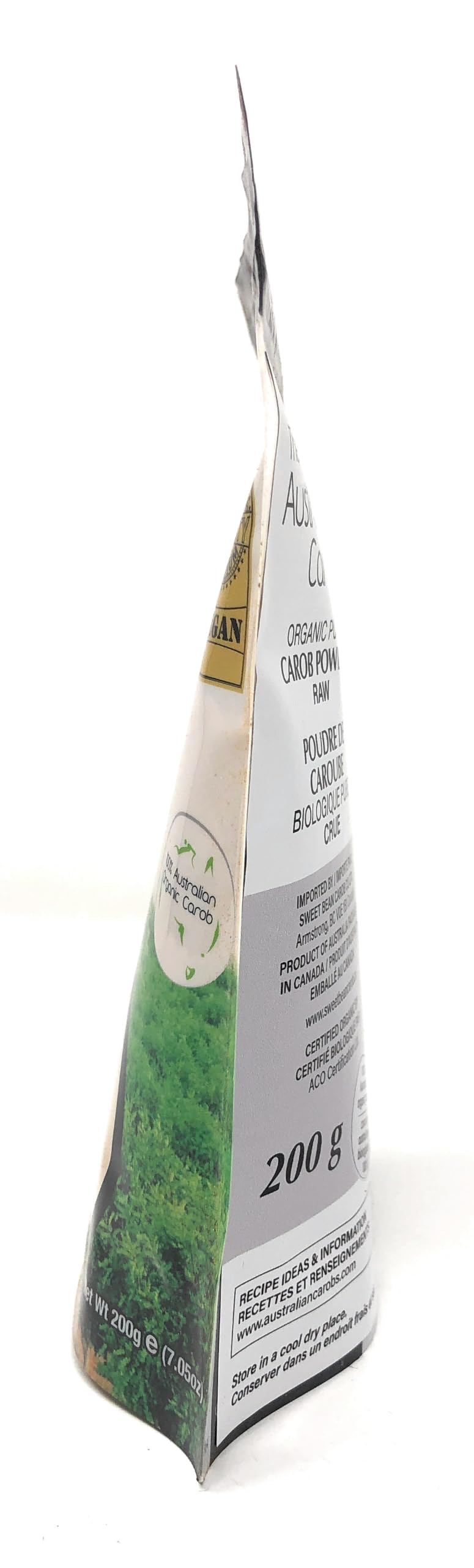 Scoop of Australian Carob Co. powder beside spoon showing portion size benefit