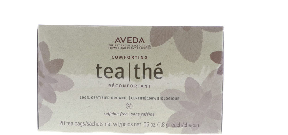 Aveda teabag beside ruler to show 1.8 g size and single-serve scale